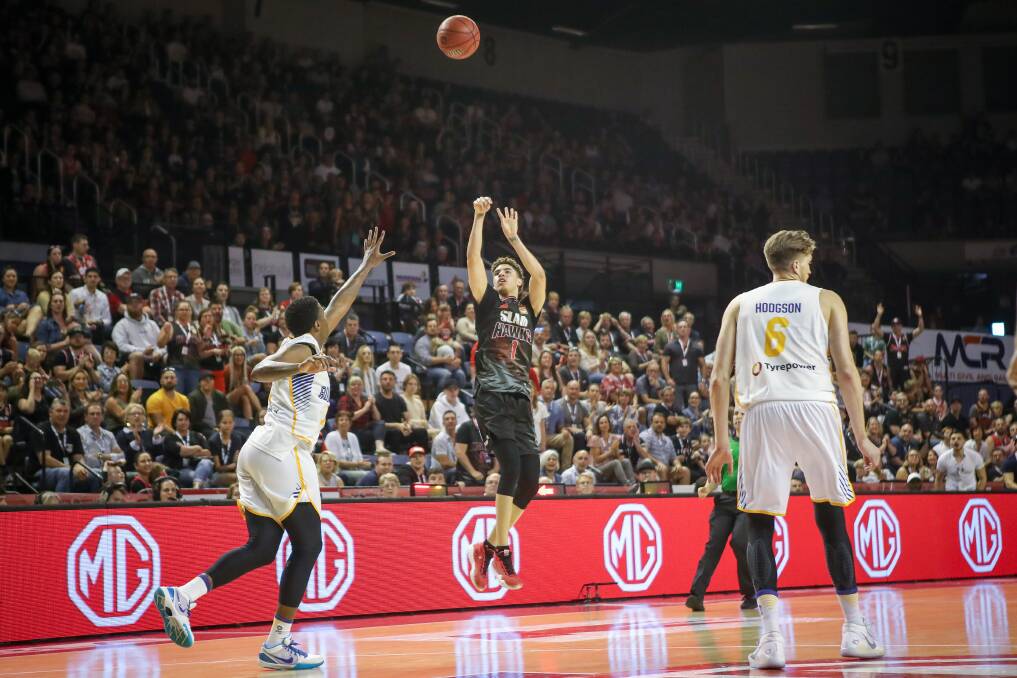 Up in the air: LaMelo Ball shoots for the Hawks at WIN Entertainment Centre during the NBL season. Picture: Adam McLean