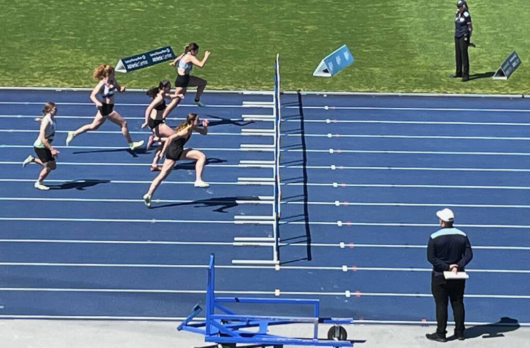 Runners in the All Schools hurdles final in Sydney.