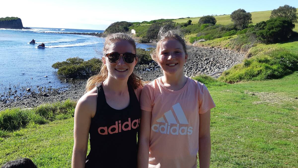 All smiles: Imogen Anderson with Jessica Hogg, after completing hard cross country course at Minnumurra during winter cross country meet.
