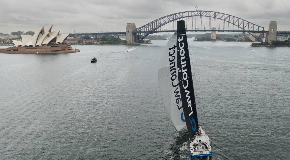 Setting sail: Law Connect and Ty Oxley have been testing their redesigned supermaxi in Sydney Harbour. Picture: Salt Lab Productions