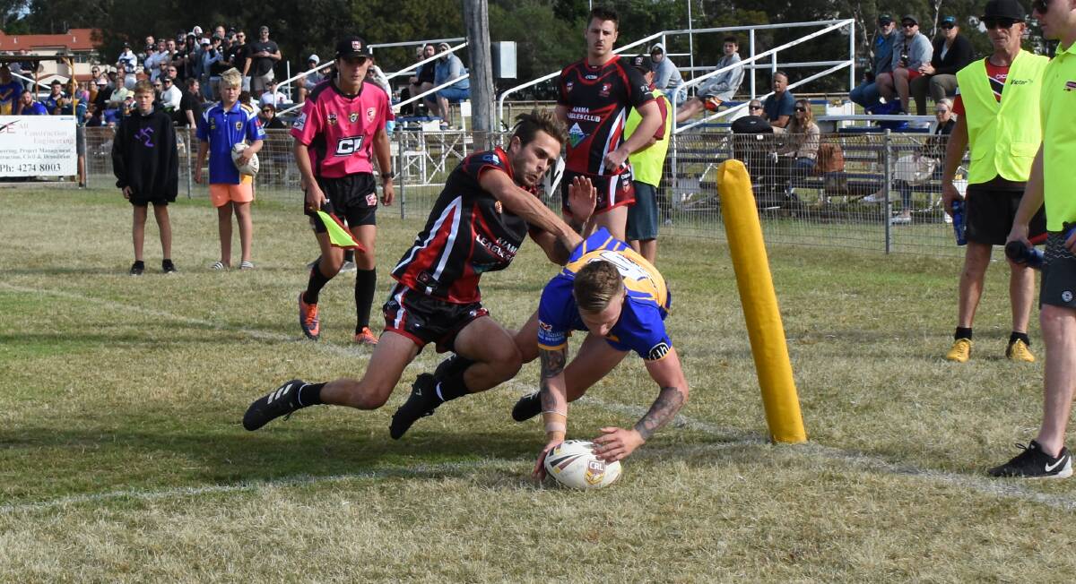Try time: Warilla winger Kye Deane crosses in the corner against Kiama on Sunday. Picture: Courtney Ward