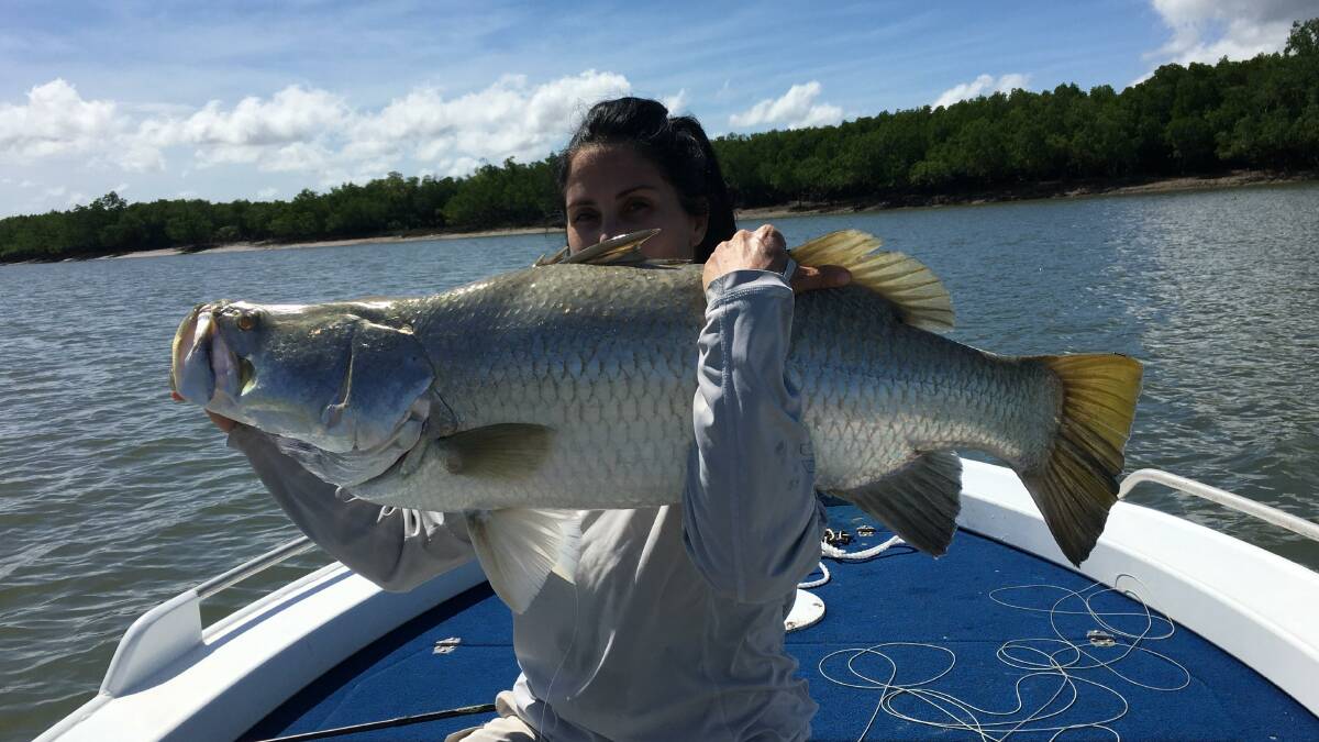 Northern composure: Rachel Robinson with her outstanding fly caught barra from Darwin Harbour.