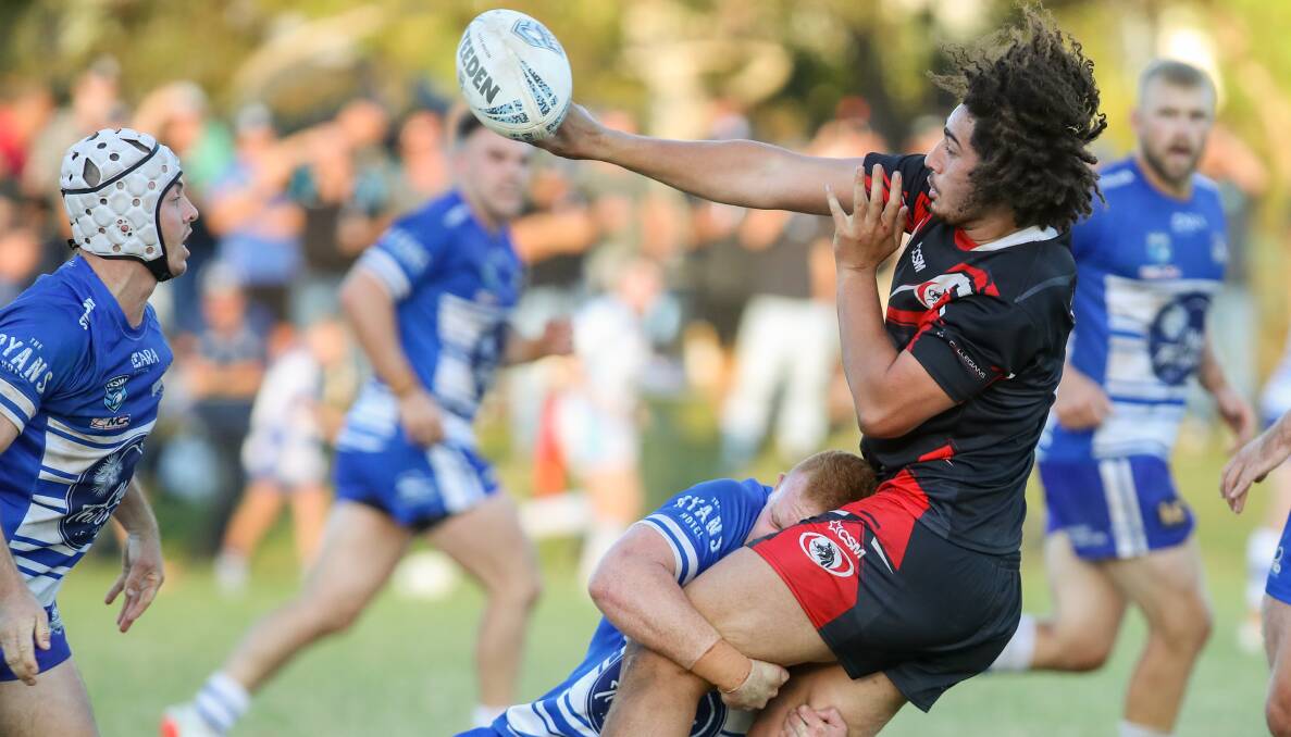 Offload: Collies' Dante Lusio keeps the ball against Thirroul earlier this season. Picture: Adam McLean