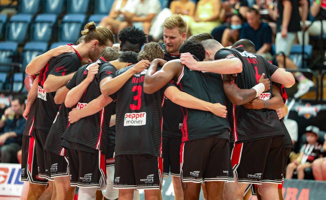 Together: Illawarra Hawks play at home against South East Melbourne on Thursday night. Picture: Adam McLean