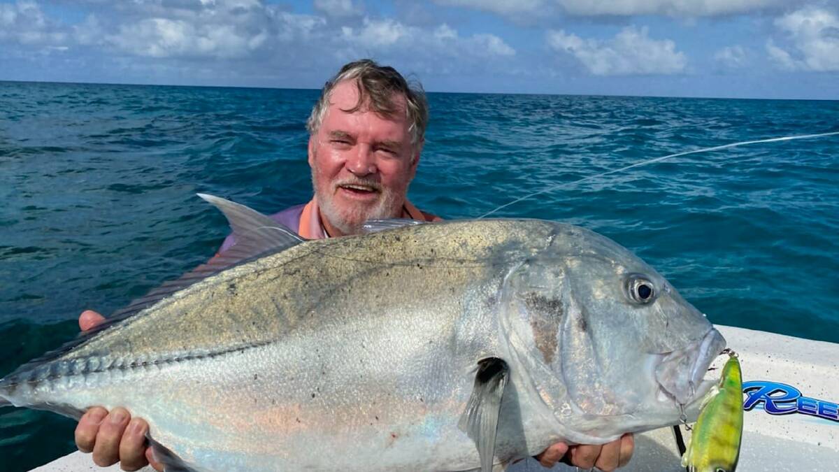 Crikey: Max Frost is all smiles with his popper-caught giant trevally.