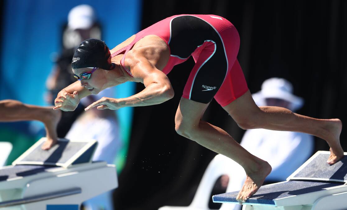 Big splash: Wollongong's Emma McKeon took out the 100-metres freestyle final at the Australian Championships on Friday. Picture: Chris Hyde/Getty Images
