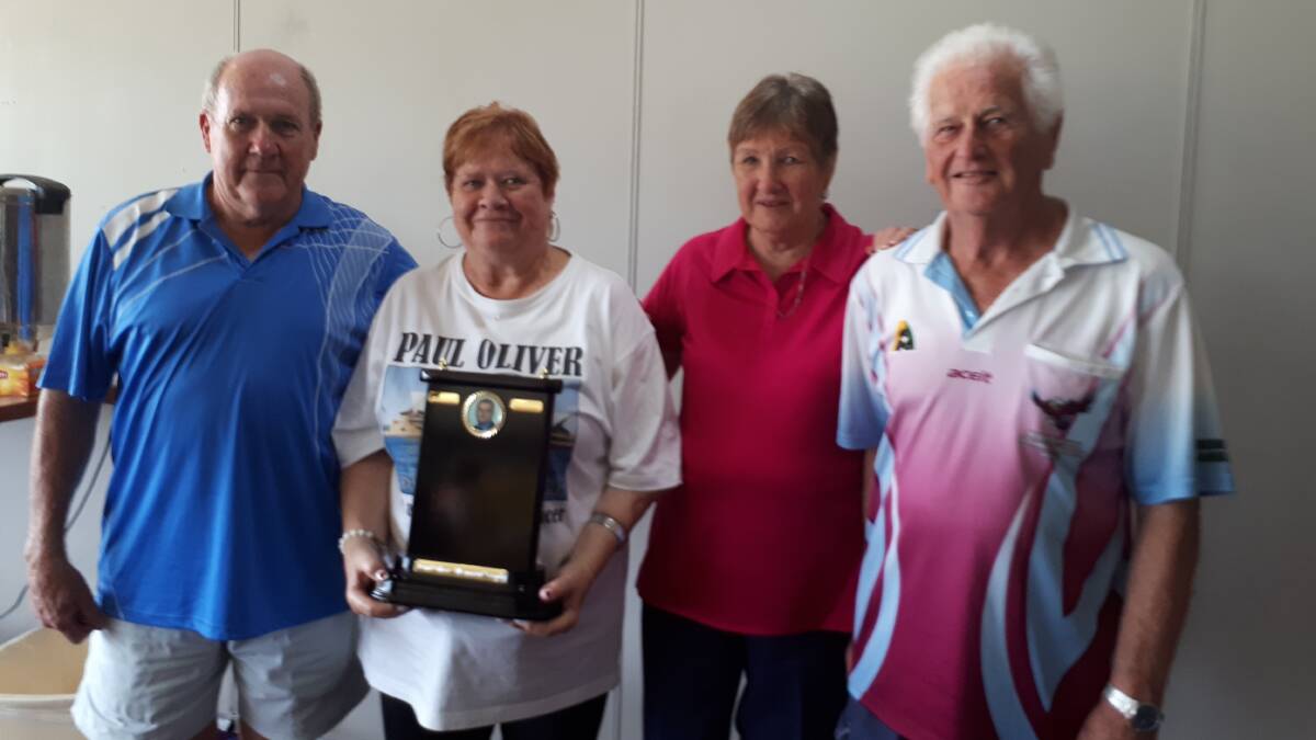 Honour: Paul Oliver’s wife Wendy (second from left) with winners of the Paul Oliver
Memorial Bowls Day, Frank Coakes, Marg Bromley and Graham Ball.