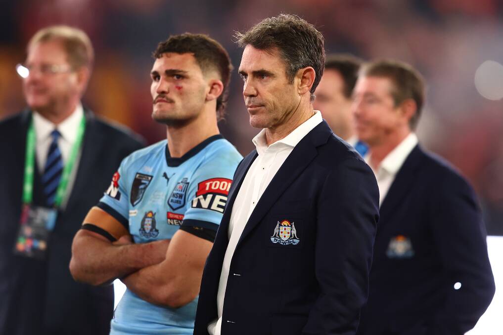 Beaten: A dejected Nathan Cleary and Brad Fittler. Picture: Chris Hyde/Getty Images