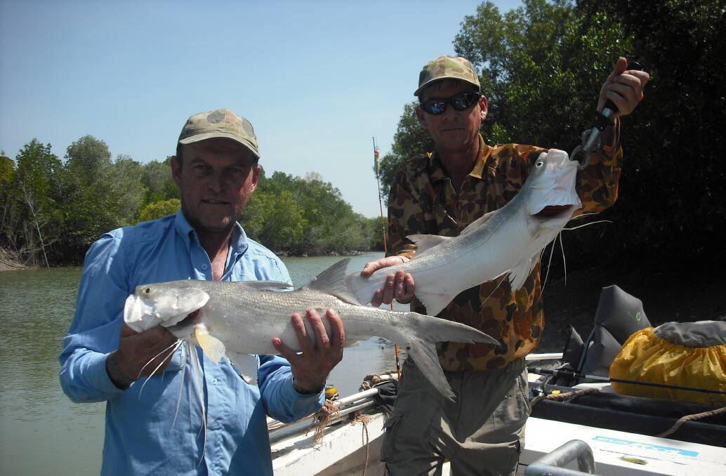 Worth the trip: Ray Simpson and Jim Wallace with some excellent eating threadfin salmon from a recent trip up FNQ.