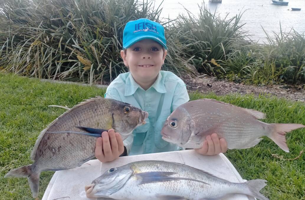 Success: Kingston Davies with his first ever catch from his first ever trip offshore.