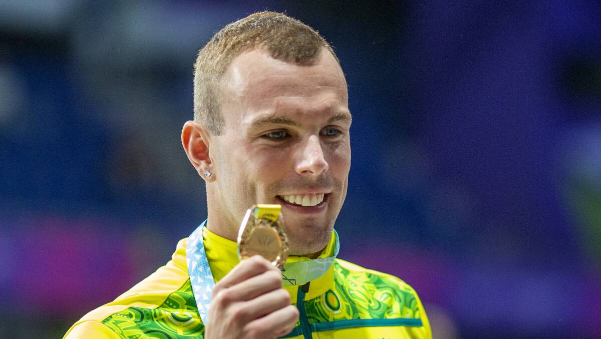 Success: Kyle Chalmers with his gold medal after winning the 100m freestyle final. Picture: Tim Clayton/Corbis via Getty Images