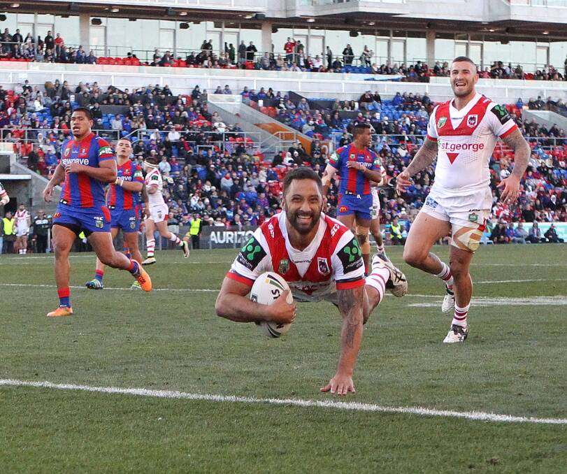 Touchdown: Benji Marshall scores for the Dragons against Newcastle at Hunter Stadium on Satuday. Picture: Getty Images