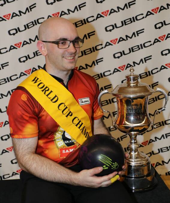 World beater: Sam Cooley with the World Cup trophy after winning Las Vegas earlier this month. Picture: Hero Noda