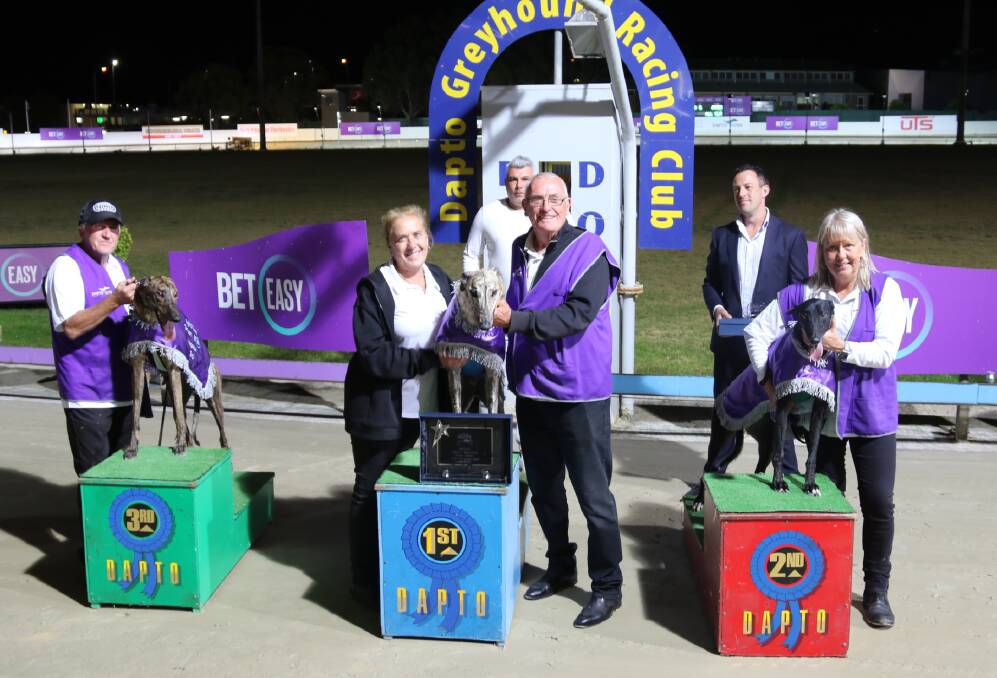 On top: Trainer Frank Hurst (middle) with Good Odds Harada after winning the Dapto Megastar on Thursday night. Picture: GRNSW