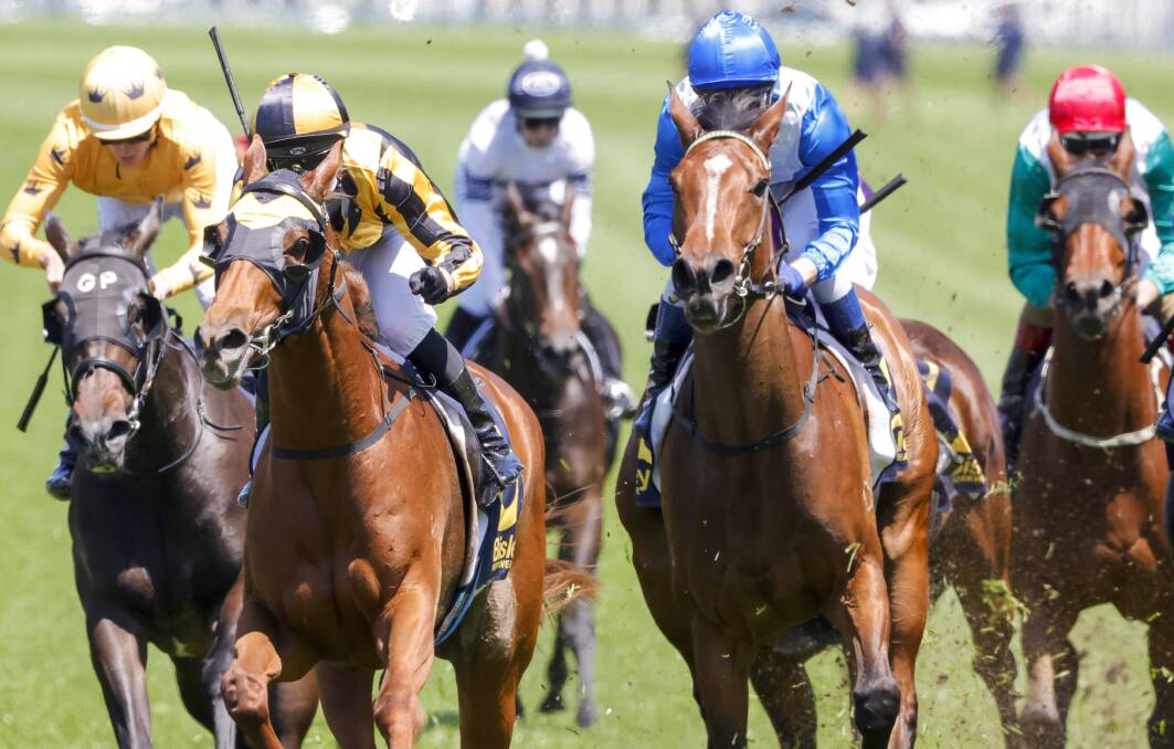 Jockey Brenton Avdulla on A Lot More Love (yellow, black) beats Call Di (blue, white) in the Reginald Allen Quality. Picture by Jenny Evans/Getty Images
