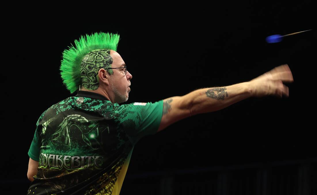 On target: World champion Peter Wright is coming to Wollongong in August. Picture: Julian Finney/Getty Images
