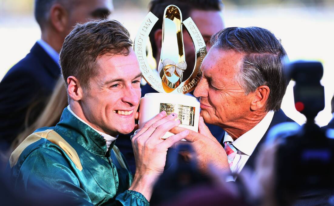 Slipper fits: Blake Shinn (left) and Peter Snowden after winning the 2016 Golden Slipper with Capitalist. Picture: Jason McCawley/Getty Images