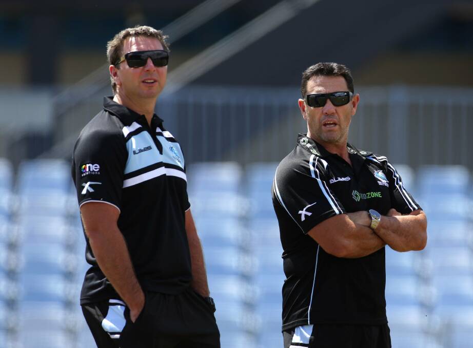 Brains trust: Former Dragons coach Steve Price (left), now an assistant with grand finalists Cronulla, with Sharks mentor Shane Flanagan. Picture: John Veage