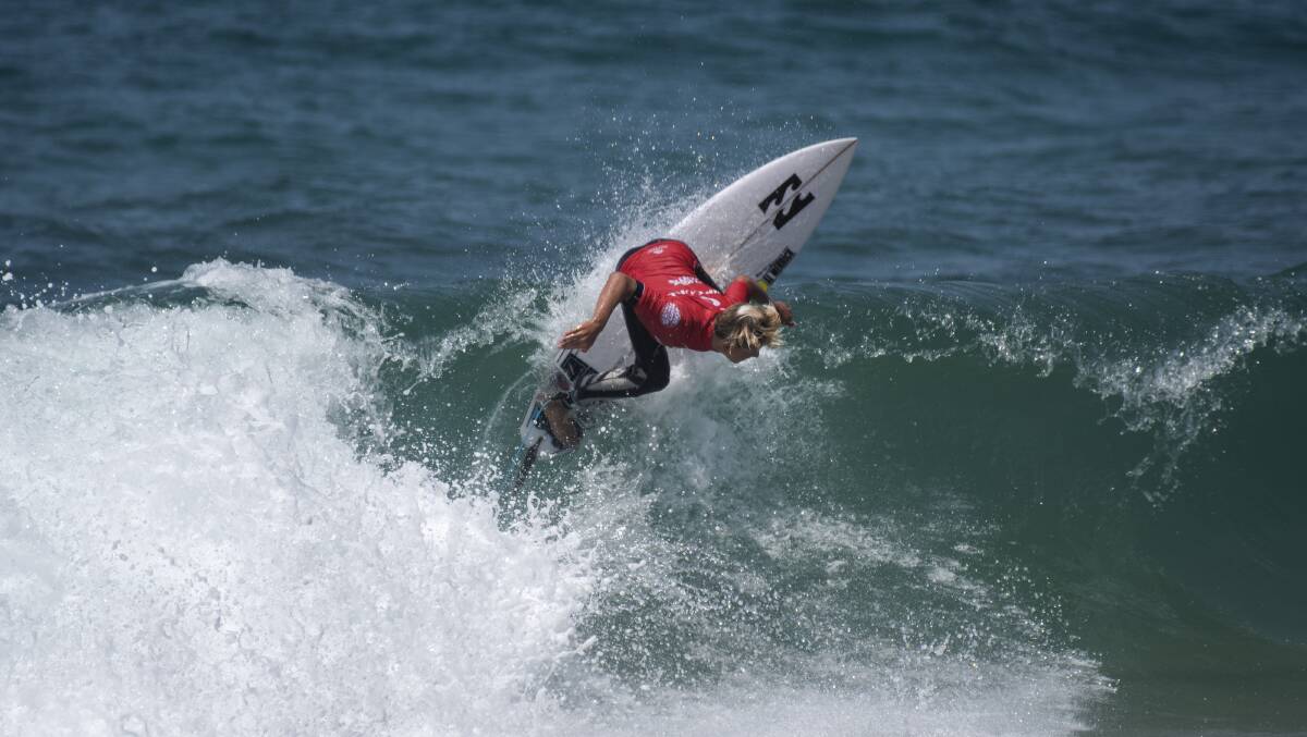 Slash: Lennix Smith during the under 14 boys national final at Woonona beach on Thursday. Picture: Ethan Smith/Surfing NSW