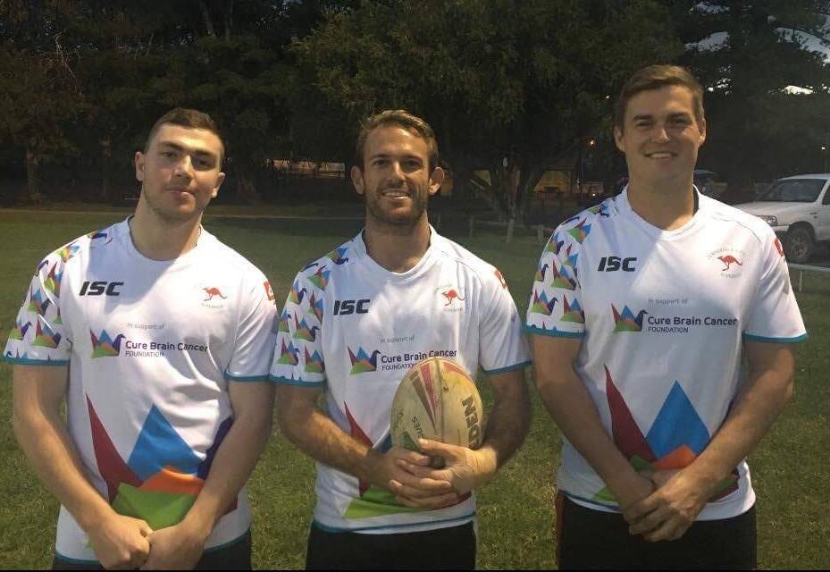 Roo beauty: Jamberoo trio Andrew Clarke, Jono Dallas and Brendan Smith show off the special jerseys as they raise money for charity.