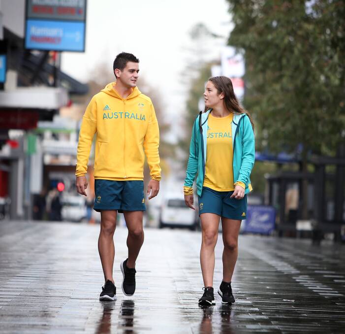 Green and bold: Australian Olympics hockey players Blake Govers and Grace Stewart at Wollongong Central. They will be part of the Illawarra celebration for Rio athletes on Saturday. Picture: Sylvia Liber