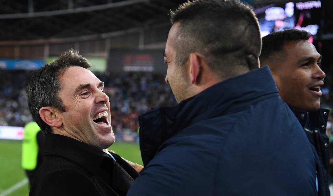 True Blues: Brad Fittler with Dragons prop Paul Vaughan when NSW won last year's State of Origin series. Picture: Nathan Hopkins/NRL Imagery