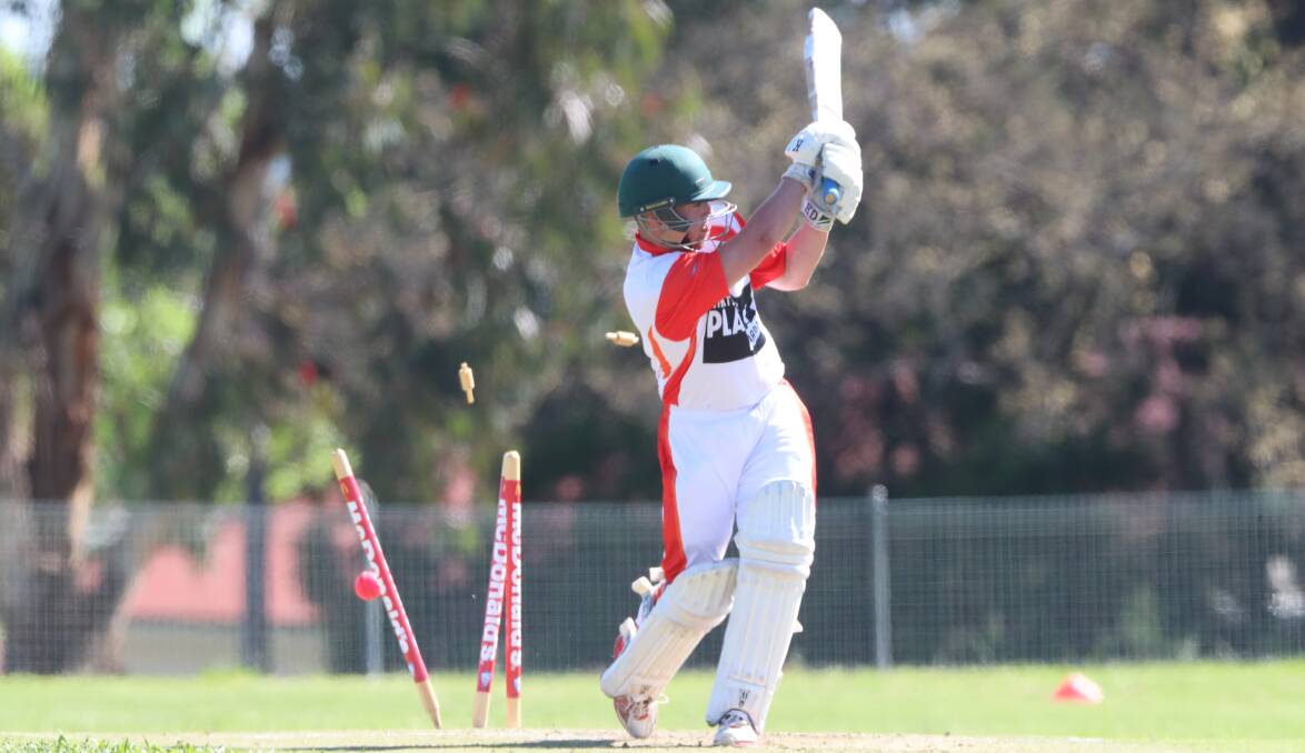 Rattle: Blake Owen is bowled during the Illawarra Flames victory over Orana on Sunday. Picture: Phil Blatch
