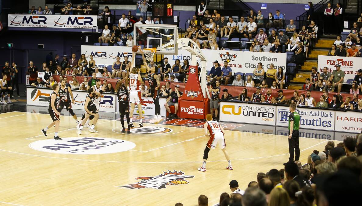 Reach out: The Illawarra Hawks in action at WIN Entertainment Centre last season. Picture: Anna Warr