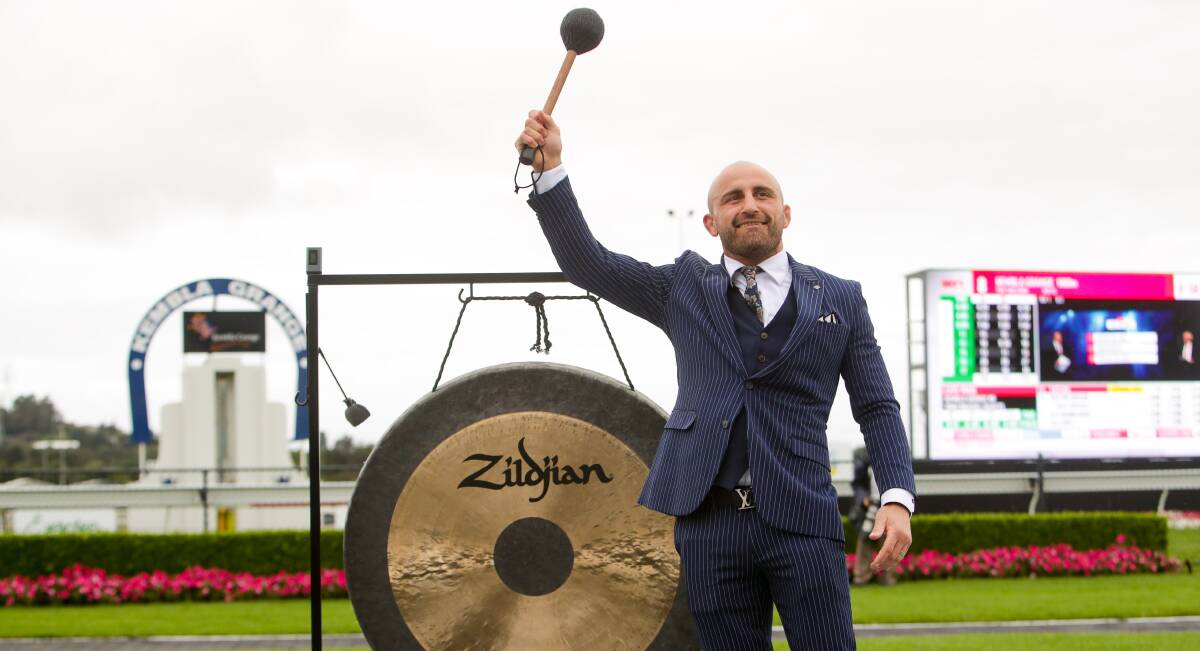 Big noise: Alex Volkanovski bangs the gong for the $1m The Gong. Picture: Adam McLean