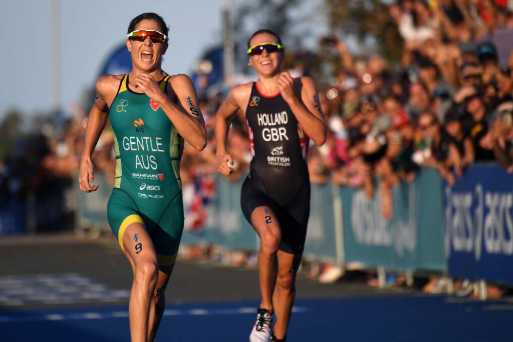 Unstoppable: Wollongong Wizards member Ashleigh Gentle sprints to the finish line at the Gold Coast ITU grand final on Saturday. Picture: ITU Media-Delly Carr
