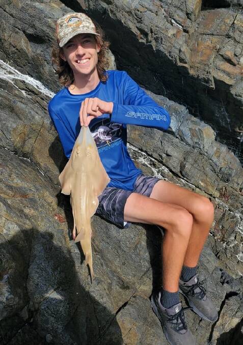 On the rocks: Brock Evans with a land based shovelly that he quickly released.