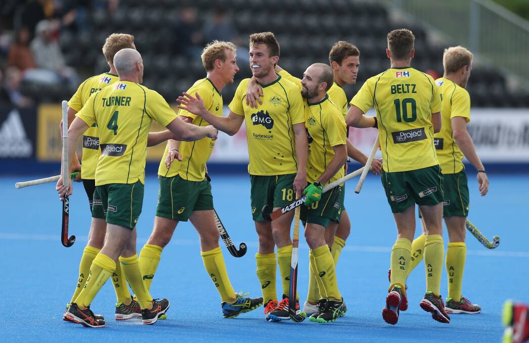 Back in business: Wollongong's Tristan White (middle) was part of the Kookaburras' International Festival of Hockey victory in Melbourne. Picture: Getty Images