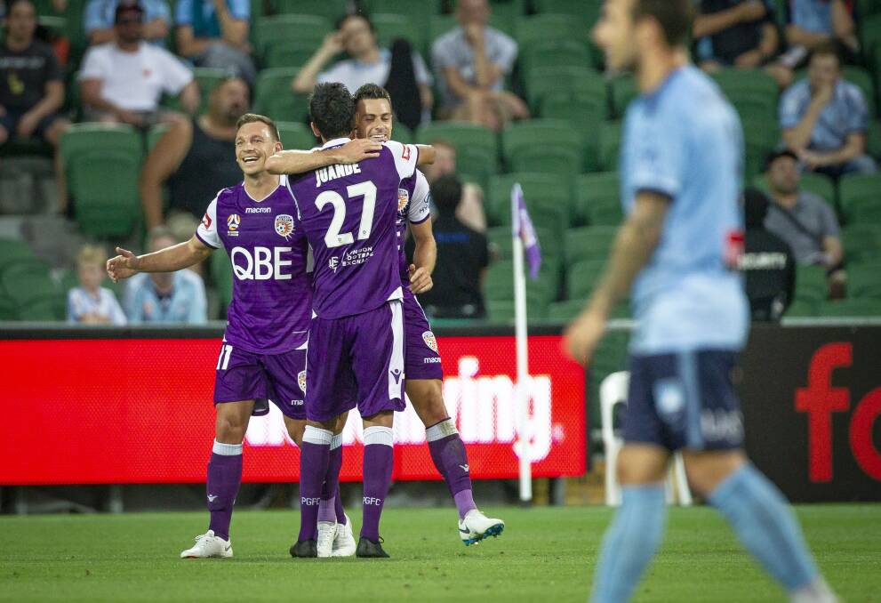 Cause for celebration: Brendon Santalab is all smiles in the 3-1 win over Sydney FC in Perth on Wednesday. 