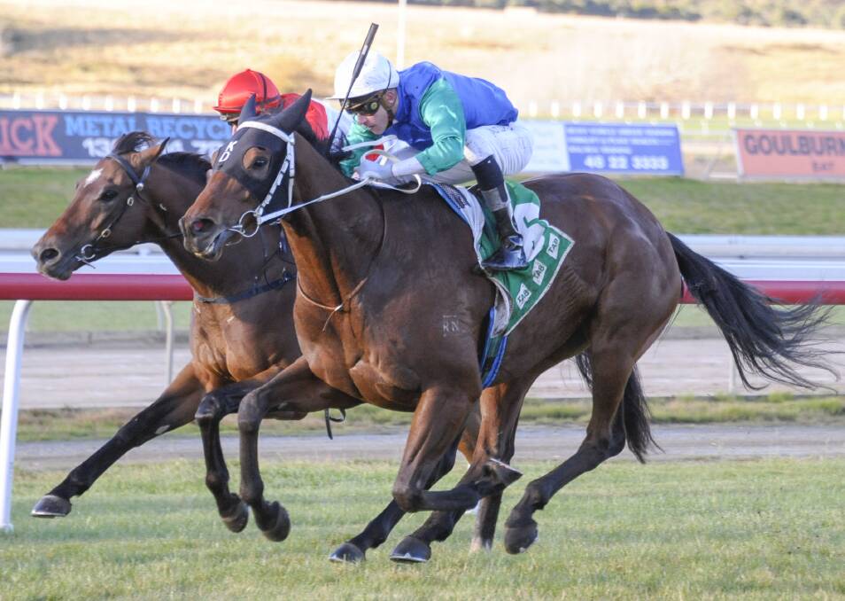 Success: Keith Dryden's Balansa (white cap) sprints to the finish line at Goulburn on Sunday. Picture: BradleyPhotos.com.au