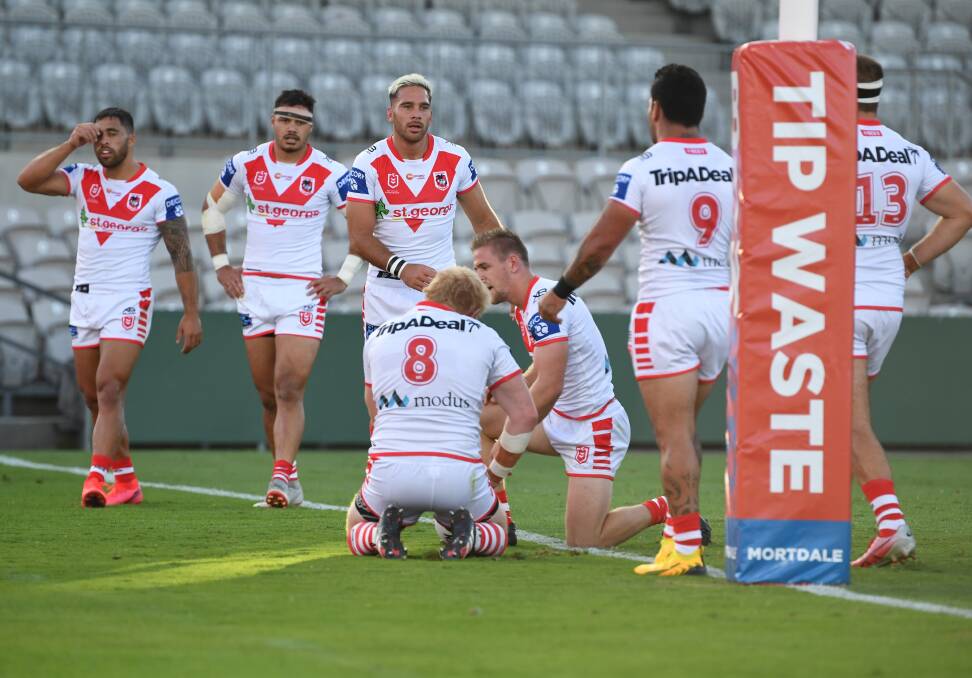 Battle: Dragons during the loss to Penrith. Pictures: NRL Imagery