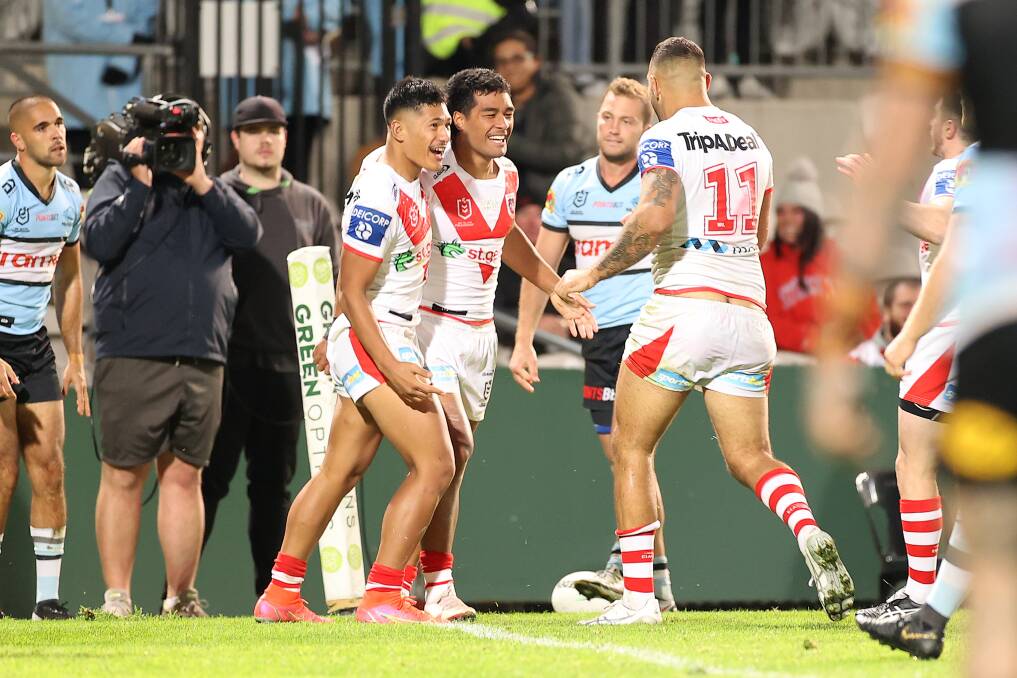 Keep the faith: Max Feagai celebrates a try against Cronulla this year. Picture: Mark Kolbe/Getty Images
