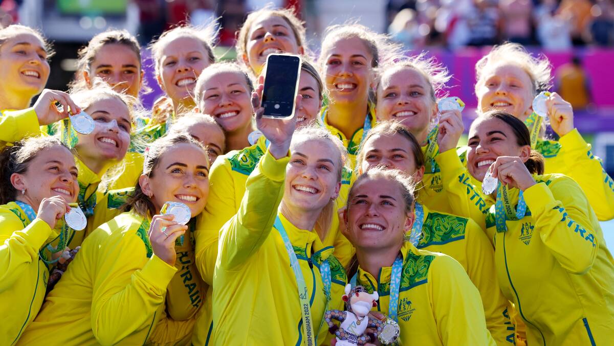 Silver smiles: The Hockeyroos take a selfie wearing their silver medals. Picture: Mark Kolbe/Getty Images