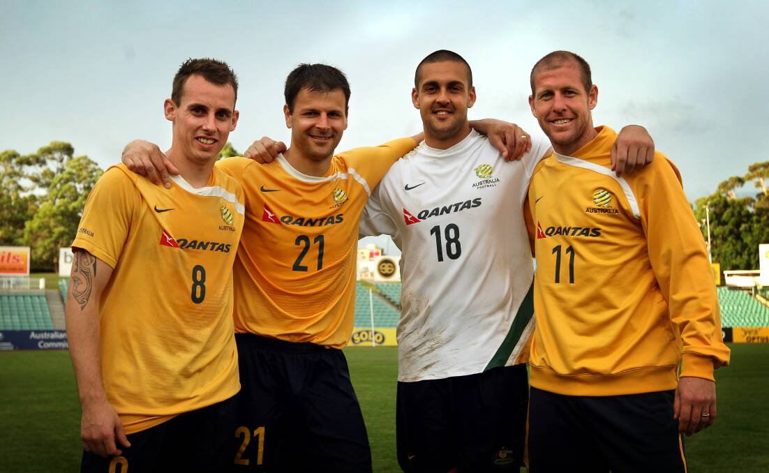 Golden glow: Luke Wilkshire with Mile Sterjovski, Adam Federici and Scott Chipperfield in 2009. Picture: Sylvia Liber