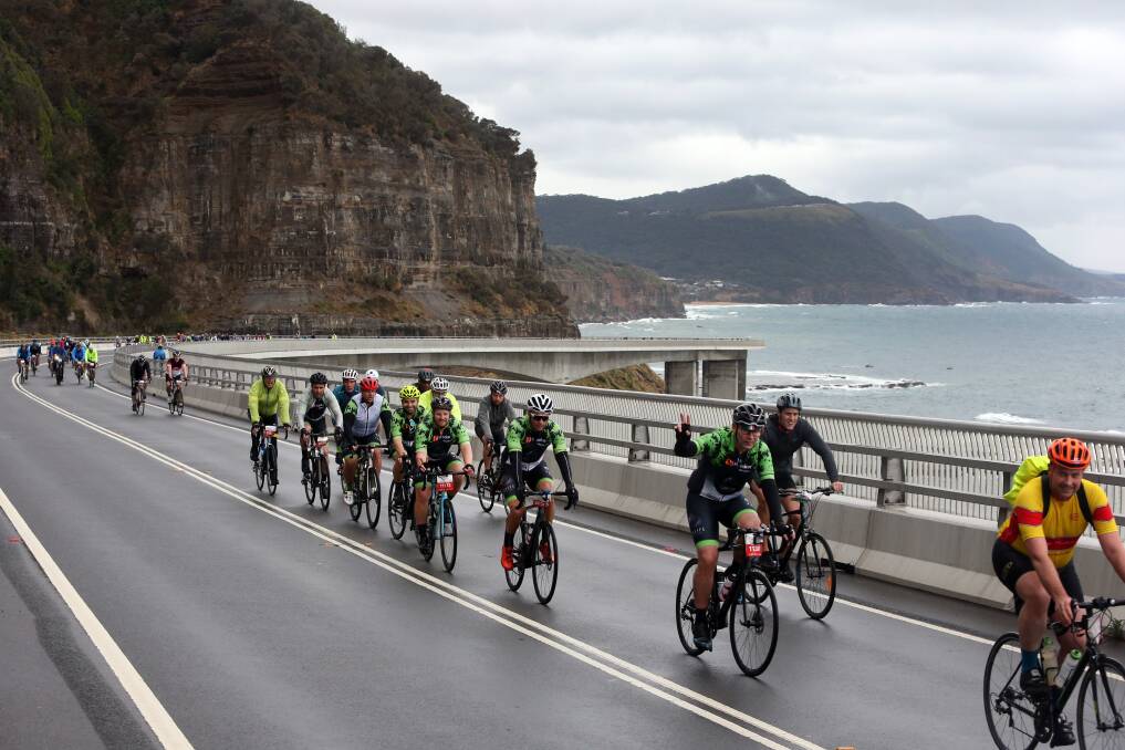 Ride of a lifetime: Cyclists cross the Sea Cliff Bridge during the Sydney to the Gong ride. Picture Robert Peet