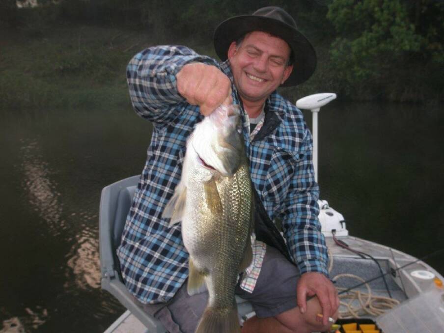 Catch: Mark Sims with a 55cm bass that had a 200mm mullet inside.