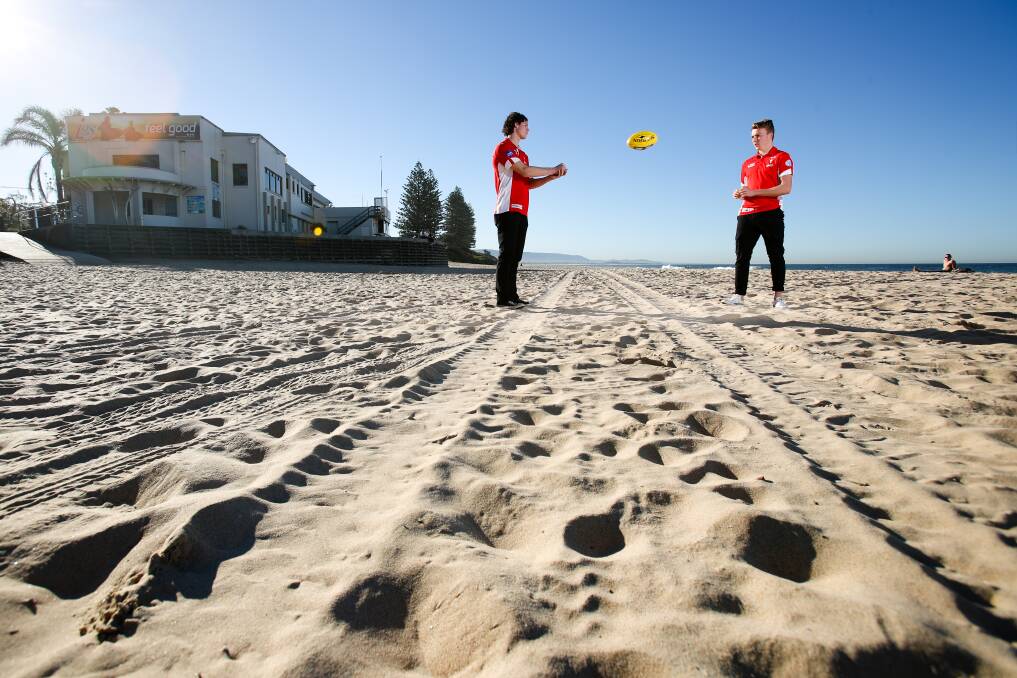 On track: Swans NEAFL duo Kyle Veerhuis (left) and Sam Thorne at North Beach. Picture: Adam McLean