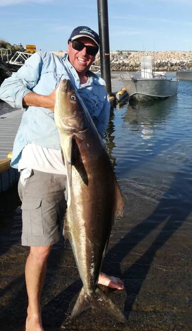 Trip away: Greg Barea visited relations in Coffs Harbour and a quick fishing trip found himself attached to this 20 plus kilogram cobia.