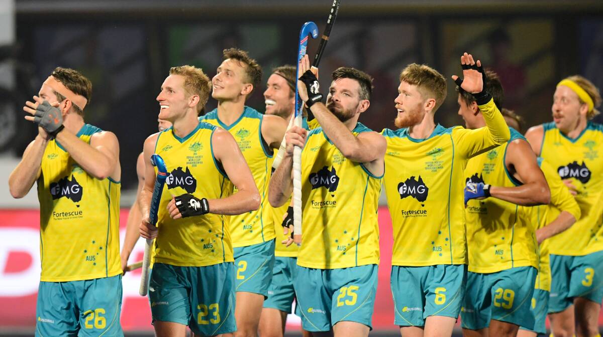 Celebrate: The Kookaburras thank the crowd after their 3-nil win. Credit: World Sport Pics