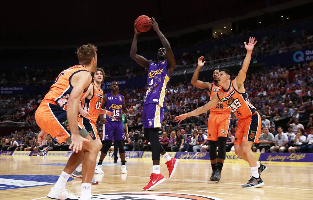 Rise: Deng Deng takes on Cairns while playing for the Kings last year. Picture: Matt King/Getty Images
