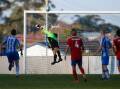 Full stretch: Tarrawanna goalkeeper Adam Rodriguez launched into action against Albion Park. Picture: Anna Warr
