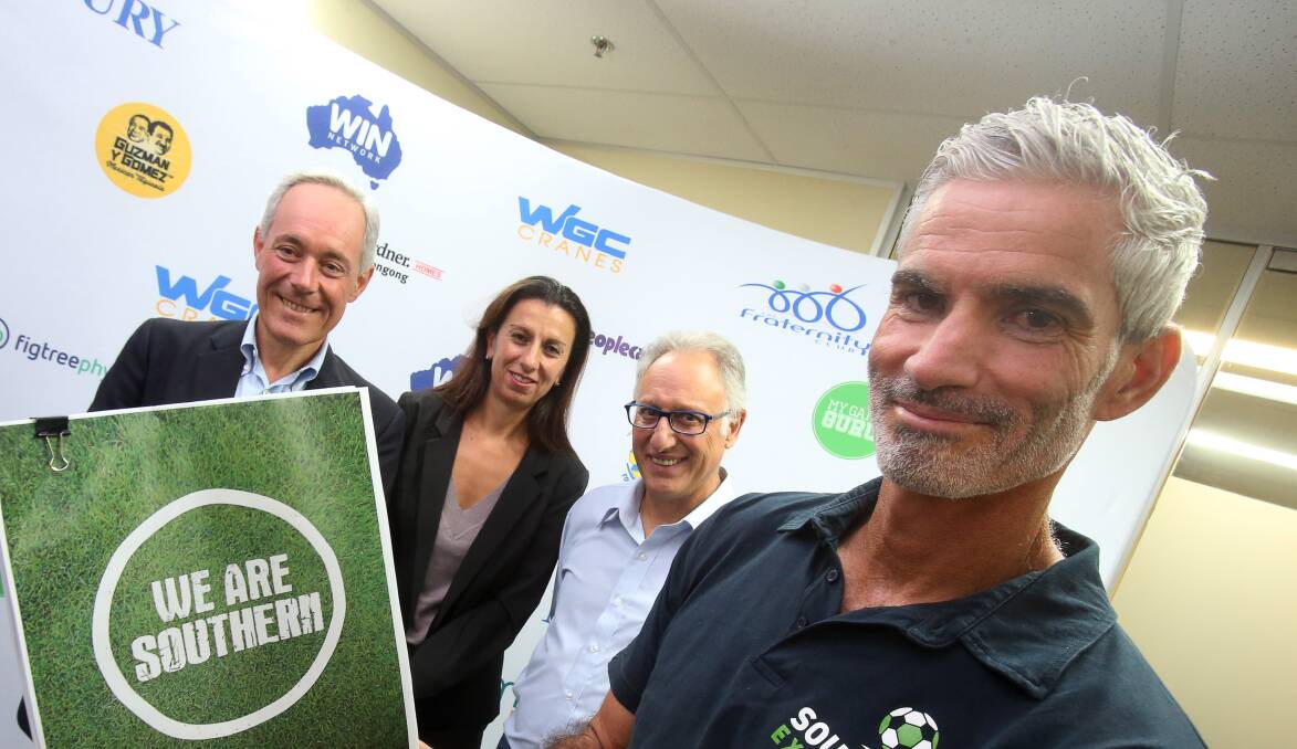 Crash landing: Southern Expansion's Morris Iemma (left) Craig Foster (right) with Football South Coast chief executive Ann-Marie Balliana and Eddy de Gabriele. Southern Expansion and the Wollongong Wolves missed out on being part of the A-League. Picture: Robert Peet