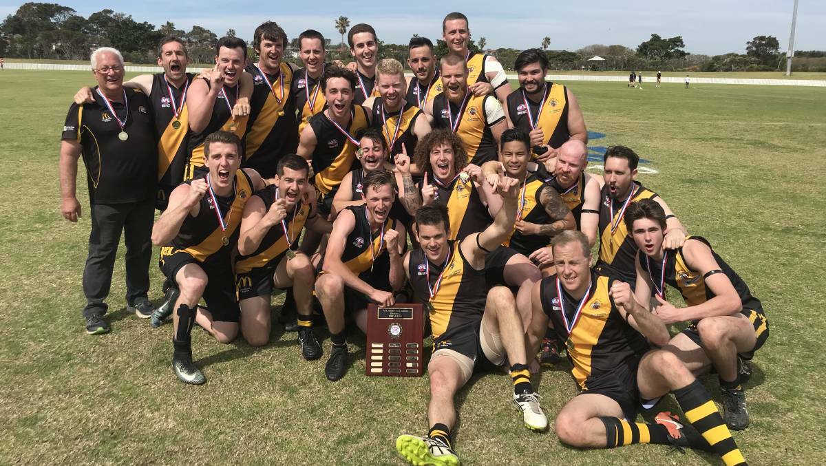 Going up: Bomaderry celebrate last year's reserve grade premiership. Picture: AFL South Coast