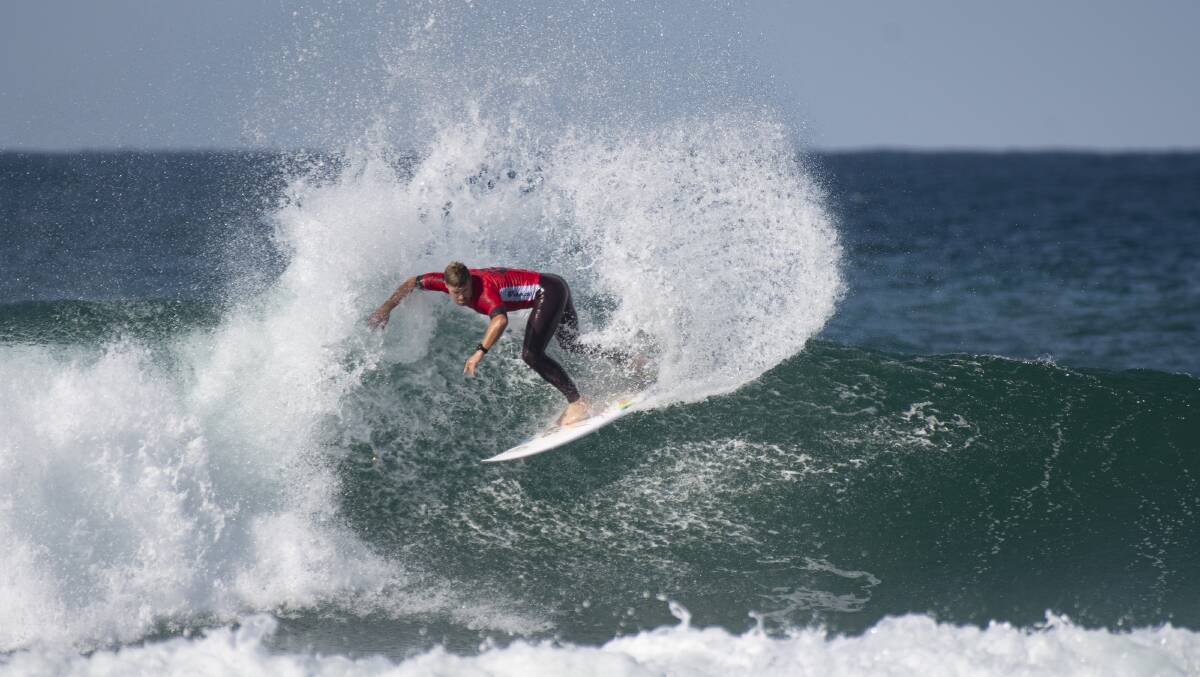 Riding high: Corrimal's Nic Squiers on his way to winning the Australian shortboard title at the Tweed. Picture: Ethan Smith/Surfing NSW
