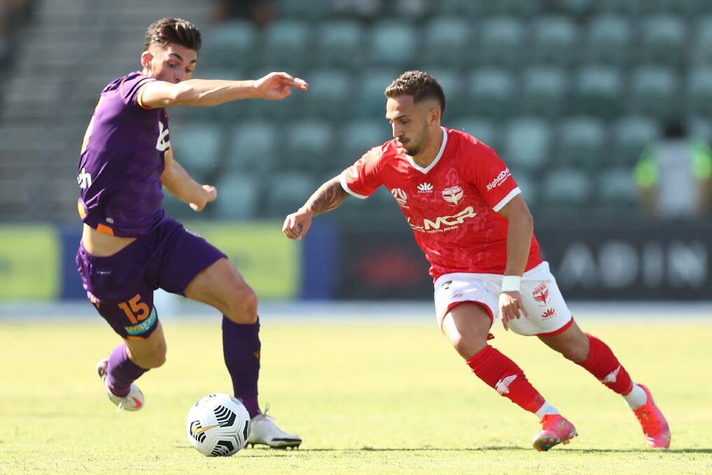 Take me on: Wellington's Reno Piscopo in the Wollongong Wolves-inspired kit during last season's game against Perth at WIN Stadium. Picture: Mark Metcalfe/Getty Images
