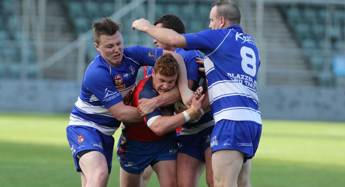Crunch: Wests beat Thirroul in last year's Illawarra Rugby League grand final at WIN Stadium. Picture: Robert Peet